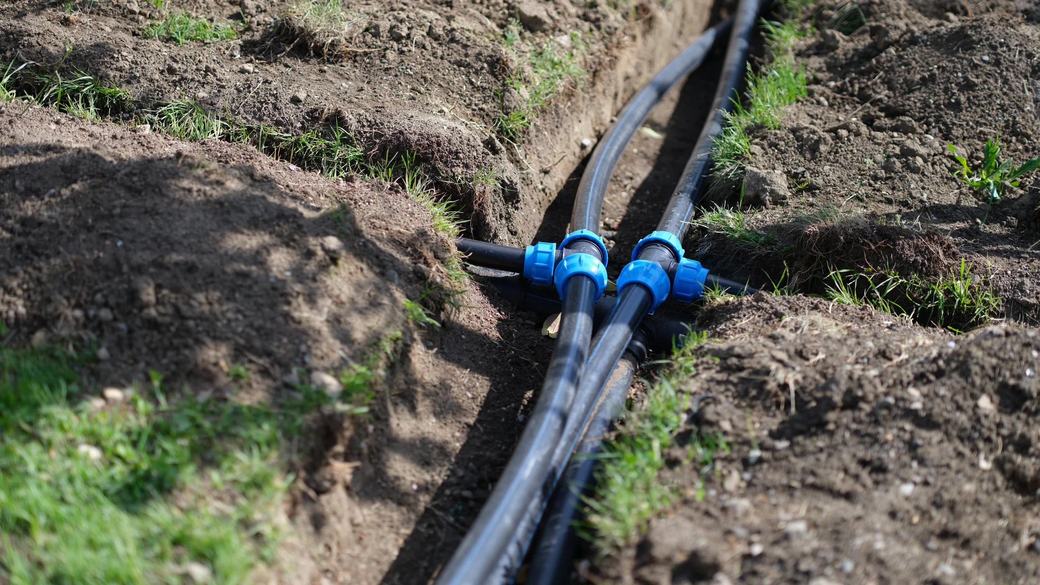 Drainage and irrigation team improving water flow in Arlington TX landscape