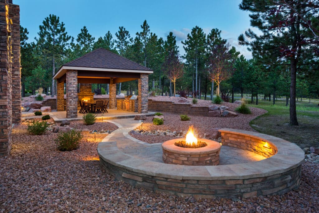 How to Mix Modern Pavers with Natural Stone for a Timeless Hardscape Look